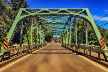 What marks the Stand by Me corner where Vern finds a penny among the storefronts of Brownsville, Oregon? 3 Calapooia River Bridge - Stand By Me, Brownsville, OR