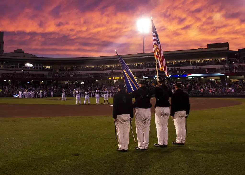 During Navy Week Dayton, Ohio, Sailors from USS Constitution's Color Guard Parade the Colors before a baseball game.