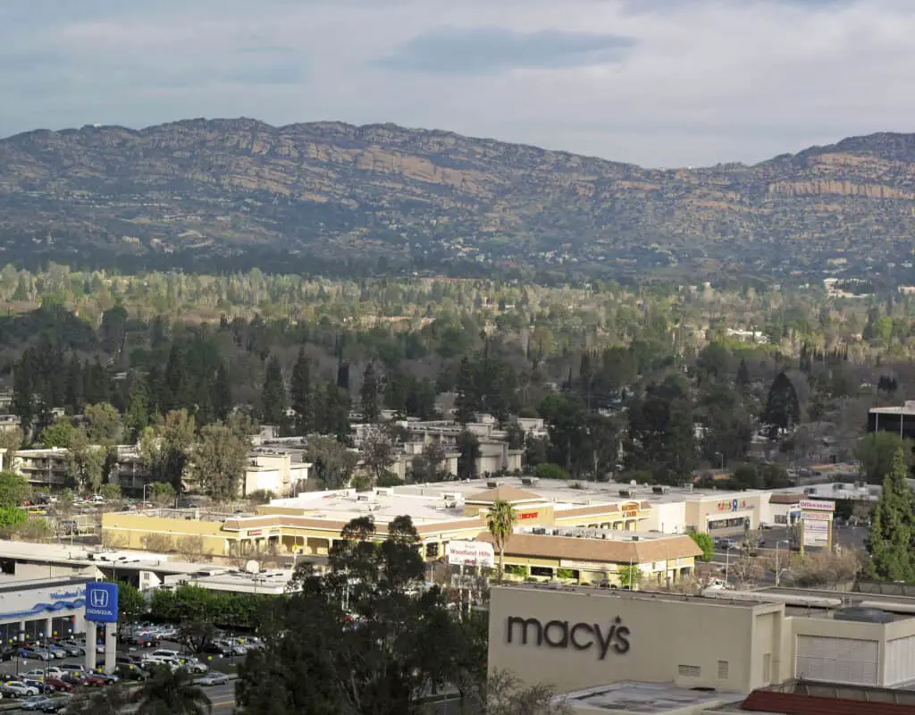 View of the Santa Susana Mountains over Woodland Hills and the Westfield Promenade mall